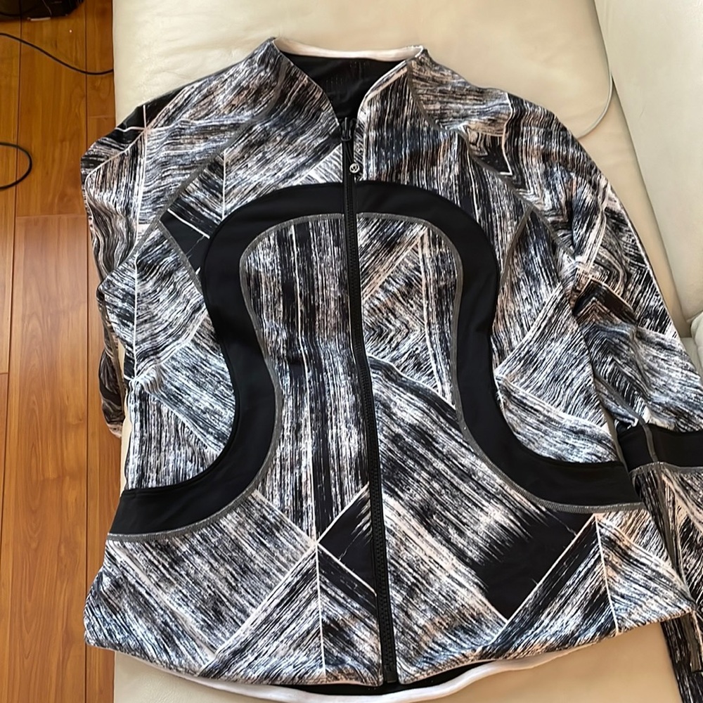 Lululemon jacket size 12. - reversible . It’s not  a thin jacket but midwear -